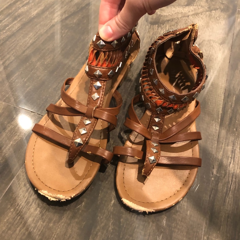 Brown gladiator flip flops